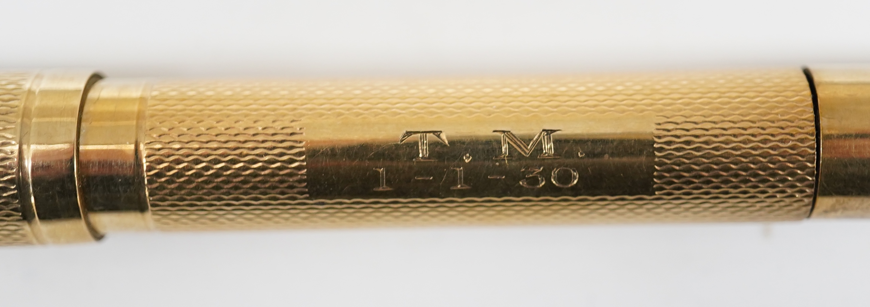 A De La Rue Onoto 9ct. gold piston fill fountain pen, appears to be working with provision for cap clip